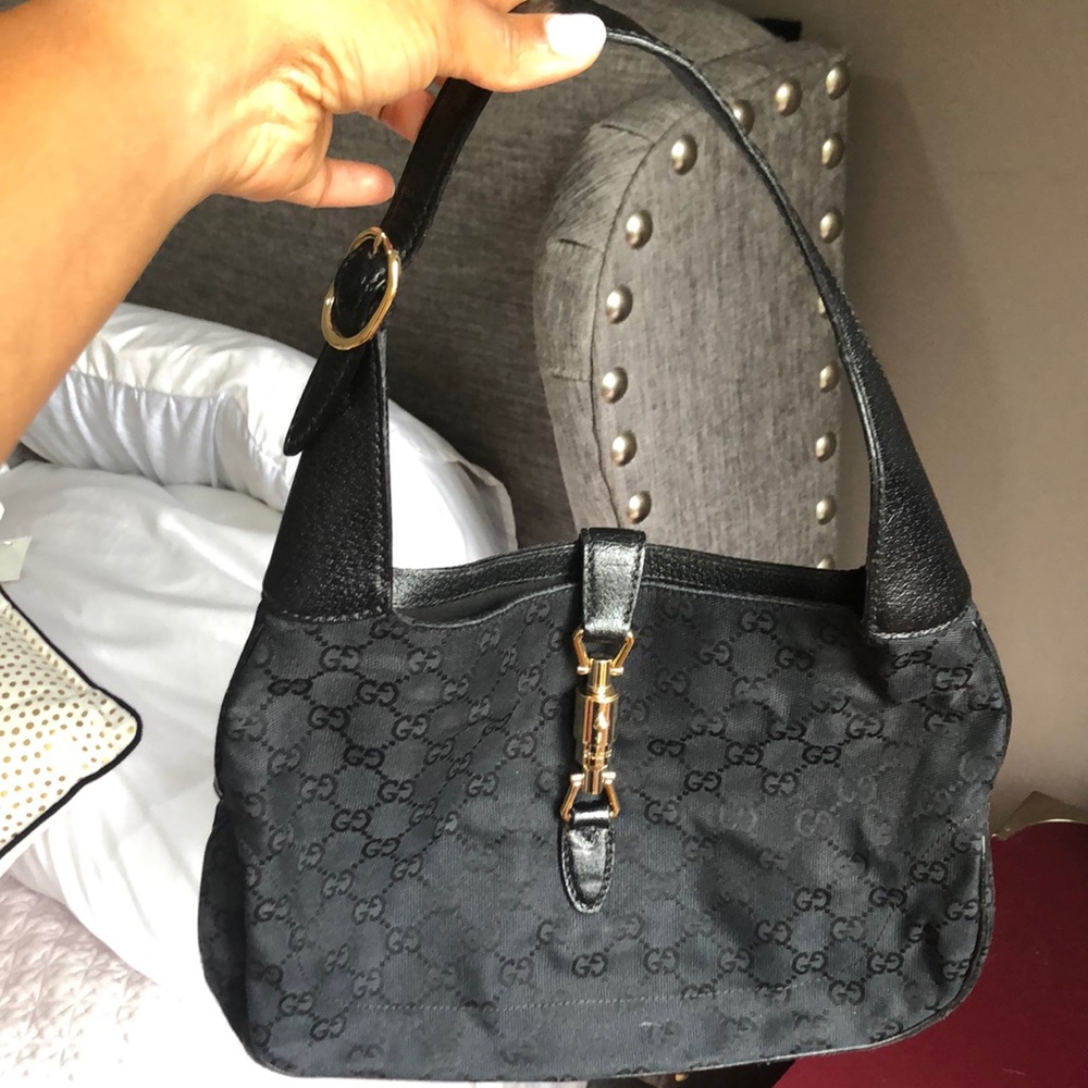 Small black Gucci print purse
